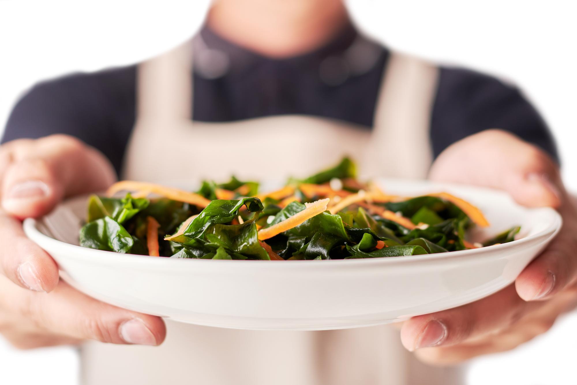 Small photo: chef plating vegetable dish